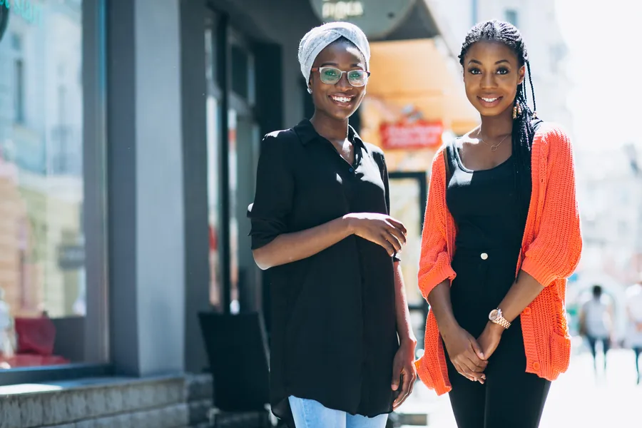 Two african american female friends